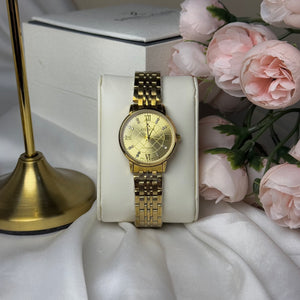 Citron golden with white stone watch with Roman numerals and a sleek design.