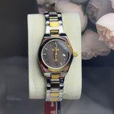 SEASTAR two tone gold watch with black premium dial